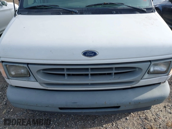 2002 Ford Econoline Cargo with VIN 1FTRE14262HB84357, listed as a IAAI auction lot 40880551 with 123,183 mi miles. Bid and sale history available at carsss.com. Image 10.