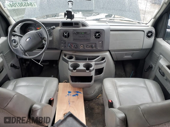 2012 Ford Econoline Passenger XL with VIN 1FBNE3BL7CDB17804, listed as a Copart auction lot 84530704 with 97,834 mi miles and Salvage title. Bid and sale history available at DreamBid. Image 8.
