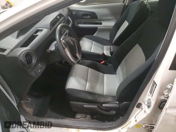 2014 Toyota Prius One z VIN JTDKDTB33E1558853, wystawiony jako Copart lot #57339425 z przebiegiem Nie podano mil oraz Nie do naprawy • Non repairable. Historia ofert i sprzedaży dostępna na DreamBid. Obrazek 7.