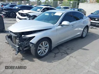 2014 Infiniti Q50 Premium z VIN JN1BV7AP9EM684709, wystawiony jako IAAI lot #41901877 z przebiegiem 91 425 mil mil oraz . Historia ofert i sprzedaży dostępna na DreamBid. Obrazek 18.
