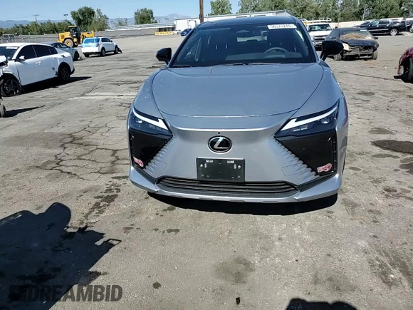 2024 Lexus RZ 300e Premium z VIN JTJABABB6RA002164, wystawiony jako Copart lot #56575245 z przebiegiem 11 687 mil mil oraz Szkoda całkowita • Salvage title. Historia ofert i sprzedaży dostępna na DreamBid. Obrazek 14.