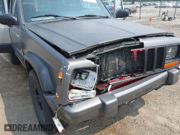 2000 Jeep Cherokee with VIN 1J4FF48S5YL159414, listed as a IAAI auction lot 42416639 with 177,932 mi miles and . Bid and sale history available at DreamBid. Image 6.