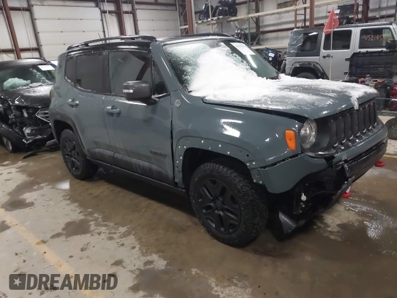 2017 Jeep Renegade Trailhawk z VIN ZACCJBCB4HPE86966, wystawiony jako IAAI lot #41502978 z przebiegiem 144 723 mil mil oraz . Historia ofert i sprzedaży dostępna na DreamBid. Obrazek 1.
