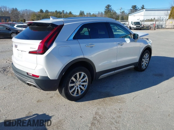 2022 Cadillac XT4 AWD Premium Luxury with VIN 1GYFZDR41NF105299, listed as a IAAI auction lot 41257154 with 34,904 mi miles and . Bid and sale history available at carsss.com. Image 4.