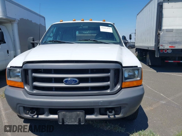1999 Ford F-350 z VIN 1FDSW34S6XEE06653, wystawiony jako IAAI lot #42697070 z przebiegiem 194 164 mil mil oraz . Historia ofert i sprzedaży dostępna na DreamBid. Obrazek 6.