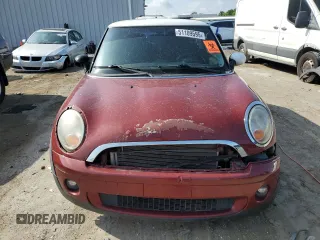 2007 MINI Hardtop z VIN WMWMF335X7TT55336, wystawiony jako Copart lot #51109595 z przebiegiem 132 358 mil mil oraz Czysty tytuł • Clean title. Historia ofert i sprzedaży dostępna na DreamBid. Obrazek 5.