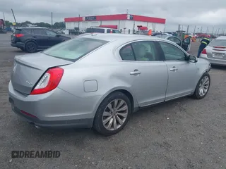 2013 Lincoln MKS с VIN 1LNHL9DK3DG604712, выставлен на аукционе IAAI как лот 42351237 с пробегом 144 927 миль миль и . История ставок и продаж доступна на DreamBid. Изображение 4.