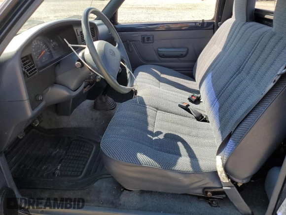 1994 Toyota Pickup with VIN 4TARN81A0RZ180129, listed as a Copart auction lot 51800195 with 153,538 mi miles and Salvage Title. Bid and sale history available at DreamBid. Image 7.
