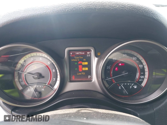 2015 Dodge Journey Crossroad with VIN 3C4PDCGG9FT617772, listed as a IAAI auction lot 42123413 with 146,778 mi miles and . Bid and sale history available at DreamBid. Image 7.