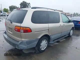 2000 Toyota Sienna LE with VIN 4T3ZF13C5YU315823, listed as a IAAI auction lot 42232438 with 248,010 mi miles and . Bid and sale history available at DreamBid. Image 4.