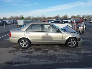 2003 Mazda Protege DX with VIN JM1BJ225X31160766, listed as a IAAI auction lot 41941361 with 190,125 mi miles and . Bid and sale history available at DreamBid. Image 12.