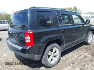 2014 Jeep Patriot Sport with VIN 1C4NJRBB1ED811019, listed as a IAAI auction lot 42181813 with 124,837 mi miles and . Bid and sale history available at DreamBid. Image 4.