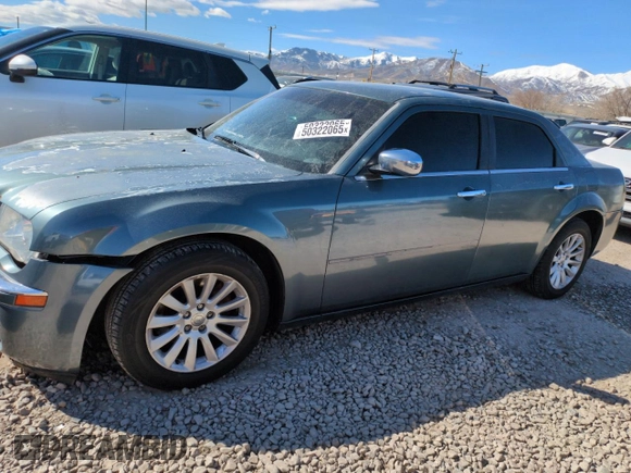 2005 Chrysler 300 with VIN 2C3AA63H35H659798, listed as a Copart auction lot 50322065 with 153,944 mi miles and Salvage Title. Bid and sale history available at carsss.com. Image 1.