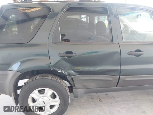 2003 Ford Escape XLT Popular 2 with VIN 1FMCU931X3KC16646, listed as a IAAI auction lot 42160863 with 130,603 mi miles and . Bid and sale history available at DreamBid. Image 6.