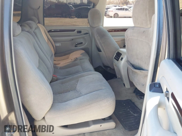 2004 Chevrolet Suburban LT z VIN 1GNEC16Z84J186242, wystawiony jako IAAI lot #41650162 z przebiegiem 268 767 mil mil oraz . Historia ofert i sprzedaży dostępna na DreamBid. Obrazek 8.
