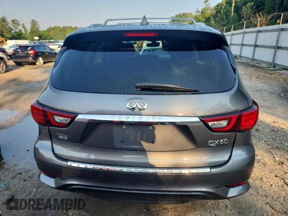 2019 Infiniti QX60 Luxe with VIN 5N1DL0MMXKC522444, listed as a Copart auction lot 63564895 with 99,748 mi miles and Salvage title. Bid and sale history available at DreamBid. Image 6.