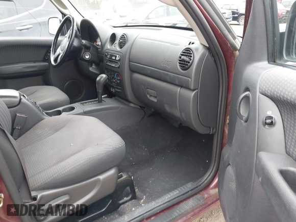 2002 Jeep Liberty Sport with VIN 1J4GL48K12W270609, listed as a IAAI auction lot 42062257 with 120,667 mi miles. Bid and sale history available at carsss.com. Image 5.