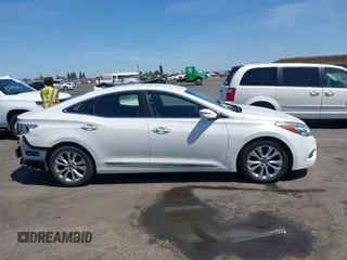 2013 Hyundai Azera with VIN KMHFG4JG5DA267347, listed as a IAAI auction lot 42580501 with 111,975 mi miles and . Bid and sale history available at DreamBid. Image 14.