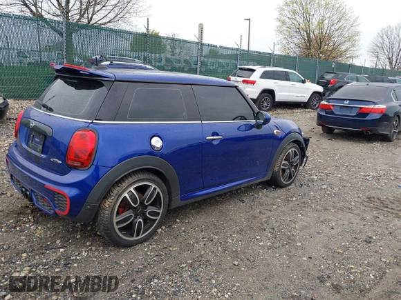 2019 MINI Hardtop John Cooper Works with VIN WMWXM9C5XK2H38801, listed as a IAAI auction lot 42029312 with 96,205 mi miles and . Bid and sale history available at DreamBid. Image 4.