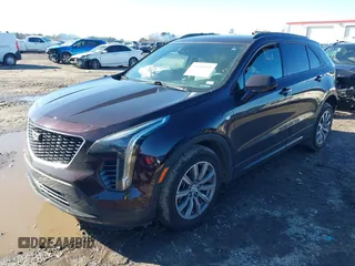 2020 Cadillac XT4 FWD Sport z VIN 1GYFZER40LF144503, wystawiony jako IAAI lot #41265649 z przebiegiem 79 120 mil mil oraz . Historia ofert i sprzedaży dostępna na DreamBid. Obrazek 17.