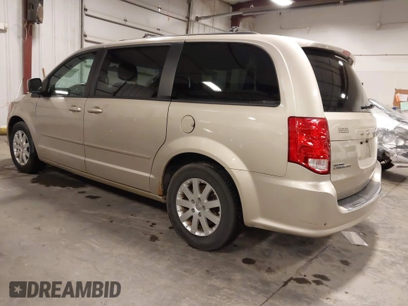 2013 Dodge Grand Caravan SXT with VIN 2C4RDGCG0DR567186, listed as a IAAI auction lot 41706119 with 112,512 mi miles and . Bid and sale history available at DreamBid. Image 3.