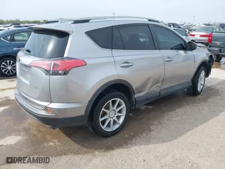 2018 Toyota RAV4 LE with VIN 2T3ZFREV2JW464807, listed as a IAAI auction lot 40966277 with 113,053 mi miles. Bid and sale history available at carsss.com. Image 4.
