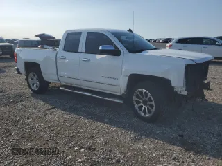 2015 Chevrolet Silverado 1500 LT with VIN 1GCVKREC1FZ332699, listed as a Copart auction lot 51160215 with 112,166 mi miles and Salvage Title. Bid and sale history available at DreamBid. Image 4.