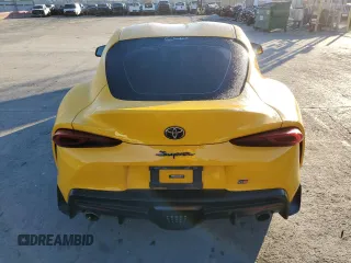 2021 Toyota GR Supra 2.0 with VIN WZ1DB2C02MW043214, listed as a Copart auction lot 82010334 with 56,704 mi miles and Clean Title. Bid and sale history available at carsss.com. Image 6.