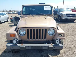 1999 Jeep Wrangler Sahara with VIN 1J4FY49S8XP462512, listed as a IAAI auction lot 42165052 with 146,135 mi miles and . Bid and sale history available at DreamBid. Image 13.