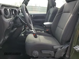 2023 Jeep Wrangler Sport S with VIN 1C4HJXDG0PW629815, listed as a Copart auction lot 53826875 with 9,260 mi miles and Salvage Title. Bid and sale history available at DreamBid. Image 7.