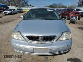 2000 Mercury Sable LS Premium z VIN 1MEFM55S2YG615740, wystawiony jako Copart lot #51266595 z przebiegiem 143 060 mil mil oraz Szkody całkowita. Historia ofert i sprzedaży dostępna na DreamBid. Obrazek 5.