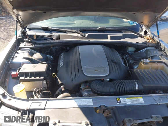 2006 Chrysler 300 C with VIN 2C3KA63HX6H518989, listed as a IAAI auction lot 41741341 with 134,636 mi miles. Bid and sale history available at carsss.com. Image 10.