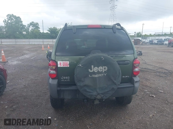 2006 Jeep Liberty Sport with VIN 1J4GL48K76W288408, listed as a IAAI auction lot 39990700 with 215,716 mi miles. Bid and sale history available at carsss.com. Image 16.