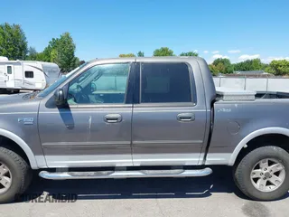 2003 Ford F-150 XLT with VIN 1FTRW08L63KD17116, listed as a IAAI auction lot 42811062 with Not provided miles and . Bid and sale history available at DreamBid. Image 6.