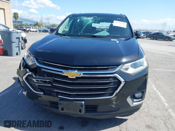 2021 Chevrolet Traverse LT Cloth with VIN 1GNERGKW9MJ162089, listed as a IAAI auction lot 41944248 with 99,586 mi miles. Bid and sale history available at carsss.com. Image 6.