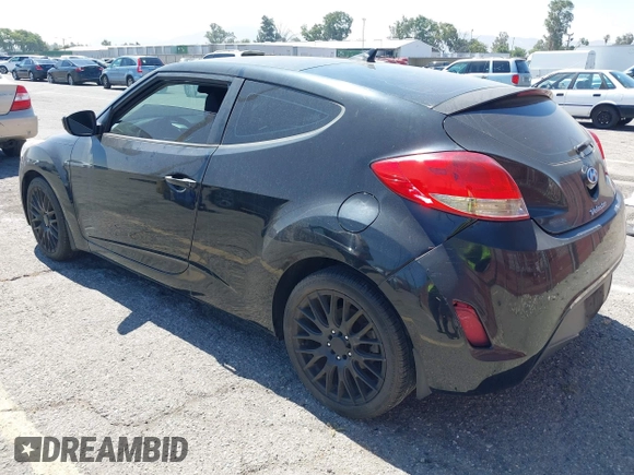 2013 Hyundai Veloster w/Black Int with VIN KMHTC6AD4DU151409, listed as a IAAI auction lot 42639582 with 283,208 mi miles and . Bid and sale history available at DreamBid. Image 3.