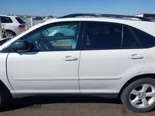 2006 Lexus RX with VIN 2T2GA31U96C048136, listed as a IAAI auction lot 41661100 with 179,832 mi miles. Bid and sale history available at carsss.com. Image 15.