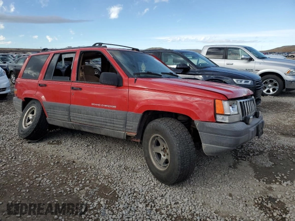 1996 Jeep Grand Cherokee Laredo with VIN 1J4GZ58Y0TC162591, listed as a Copart auction lot 43027025 with 383,318 mi miles and Salvage Title. Bid and sale history available at carsss.com. Image 4.