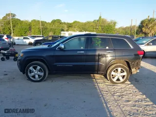 2014 Jeep Grand Cherokee Overland with VIN 1C4RJFCG0EC206358, listed as a IAAI auction lot 41893508 with 120,327 mi miles. Bid and sale history available at carsss.com. Image 14.
