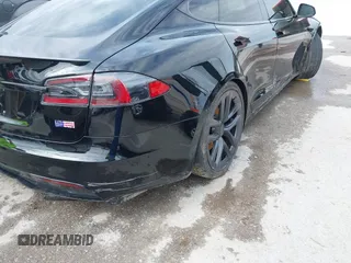 2022 Tesla Model S Plaid with VIN 5YJSA1E60NF460244, listed as a IAAI auction lot 41996403 with Not provided miles and . Bid and sale history available at DreamBid. Image 20.