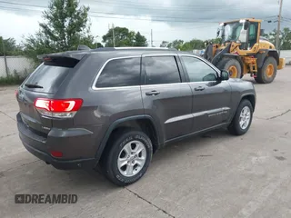 2017 Jeep Grand Cherokee Laredo with VIN 1C4RJFAG1HC604461, listed as a IAAI auction lot 42685509 with 143,462 mi miles and . Bid and sale history available at DreamBid. Image 4.