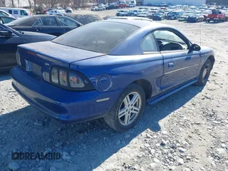 1996 Ford Mustang with VIN 1FALP4042TF140884, listed as a IAAI auction lot 41279611 with 233,047 mi miles. Bid and sale history available at carsss.com. Image 4.