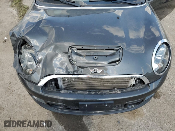 2012 MINI Hardtop S with VIN WMWSV3C53CTY25517, listed as a Copart auction lot 62315535 with 50,680 mi miles and Salvage title. Bid and sale history available at DreamBid. Image 11.