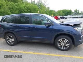 2018 Honda Pilot EX-L with VIN 5FNYF6H57JB046433, listed as a IAAI auction lot 42296714 with Not provided miles and . Bid and sale history available at DreamBid. Image 12.