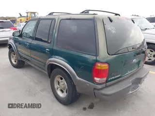 2000 Ford Explorer XLT z VIN 1FMZU63EXYZA22693, wystawiony jako IAAI lot #41350520 z przebiegiem 244 843 mil mil oraz . Historia ofert i sprzedaży dostępna na DreamBid. Obrazek 3.