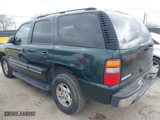 2003 Chevrolet Tahoe LS with VIN 1GNEC13V13J250718, listed as a IAAI auction lot 41981819 with 303,969 mi miles. Bid and sale history available at carsss.com. Image 3.