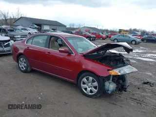 2009 Kia Optima LX with VIN KNAGE228295292892, listed as a IAAI auction lot 41812221 with 179,276 mi miles. Bid and sale history available at carsss.com. Image 1.
