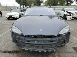 2014 Tesla Model S 60 with VIN 5YJSA1S14EFP56277, listed as a Copart auction lot 57162685 with Not provided miles and Salvage title. Bid and sale history available at DreamBid. Image 5.