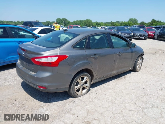 2013 Ford Focus SE with VIN 1FADP3F20DL266913, listed as a IAAI auction lot 42457006 with Not provided miles and . Bid and sale history available at DreamBid. Image 4.