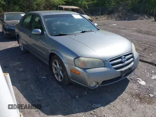 2003 Nissan Maxima GLE z VIN JN1DA31A13T419438, wystawiony jako IAAI lot #42054663 z przebiegiem 150 918 mil mil oraz . Historia ofert i sprzedaży dostępna na DreamBid. Obrazek 1.